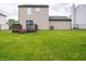 Large backyard with a back deck and a chain-link fence at 3734 Lacebark Dr, Indianapolis, IN 46235