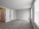 Bright, airy bedroom with plush carpeting and abundant natural light at 3734 Lacebark Dr, Indianapolis, IN 46235