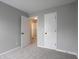 Bedroom with carpet, two closets and neutral paint at 3734 Lacebark Dr, Indianapolis, IN 46235
