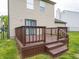 Close-up of a wooden deck with steps leading to the backyard, perfect for outdoor enjoyment at 3734 Lacebark Dr, Indianapolis, IN 46235