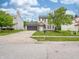 Inviting two-story home featuring attached garage, driveway and a well-manicured front lawn at 3734 Lacebark Dr, Indianapolis, IN 46235