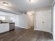 Open floor plan living room showing view of kitchen, pantry and hallway at 3734 Lacebark Dr, Indianapolis, IN 46235