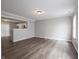 Bright living room with modern wood flooring and neutral paint, offering a clean aesthetic at 3734 Lacebark Dr, Indianapolis, IN 46235