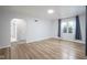 Spacious bedroom features wood floors, arched doorway, and bright natural light at 400 E 34Th St, Anderson, IN 46013