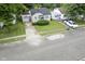 Charming single Gathering home with an attached garage, neat lawn, and a driveway at 400 E 34Th St, Anderson, IN 46013