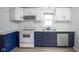Updated kitchen showcases modern appliances, granite countertops, and new flooring at 400 E 34Th St, Anderson, IN 46013