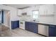 Stylish kitchen with stainless steel dishwasher, stone countertops, and white subway tile at 400 E 34Th St, Anderson, IN 46013