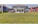 Expansive backyard featuring a gazebo with seating and an outdoor dining area on a large concrete patio at 4163 Ironclad Dr, Bargersville, IN 46106