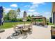 Outdoor patio with dining and lounge area under a gazebo, perfect for entertaining in a manicured yard at 4163 Ironclad Dr, Bargersville, IN 46106