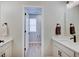 A pristine bathroom features double vanities, sleek fixtures, and a bright, airy design for a spa-like experience at 4163 Ironclad Dr, Bargersville, IN 46106