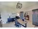 Spacious home office featuring a modern desk, comfortable chair, stylish cabinet, and neutral decor at 4163 Ironclad Dr, Bargersville, IN 46106