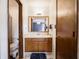 Bathroom with a vanity, mirror and a view of the bedroom at 4382 Castlebay Way, Indianapolis, IN 46254