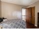 A bedroom with a closet and hardwood flooring at 4382 Castlebay Way, Indianapolis, IN 46254