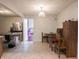 A dinette set is situated in a kitchen with a refrigerator at 4382 Castlebay Way, Indianapolis, IN 46254