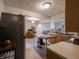 Spacious kitchen features a stainless steel refrigerator and kitchen island at 4382 Castlebay Way, Indianapolis, IN 46254