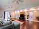 Open floorplan living room with vaulted ceiling and hardwood floors at 4382 Castlebay Way, Indianapolis, IN 46254