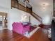Bright and airy living room with hardwood floors and vaulted ceiling at 4382 Castlebay Way, Indianapolis, IN 46254