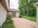 Back patio featuring a grill and beautiful backyard at 4382 Castlebay Way, Indianapolis, IN 46254