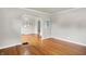 Living room boasts hardwood floors, arched doorways, and neutral paint at 4641 Crittenden Ave, Indianapolis, IN 46205