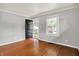 Spacious living room with hardwood floors, ample natural light, and a welcoming atmosphere at 4641 Crittenden Ave, Indianapolis, IN 46205