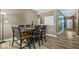 Inviting dining room with wooden table, hardwood floors, and ample seating for Gathering gatherings at 4736 Blue Marlin Way, Indianapolis, IN 46239