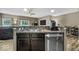 Modern kitchen with stainless steel appliances and granite countertops, ideal for culinary enthusiasts at 4736 Blue Marlin Way, Indianapolis, IN 46239