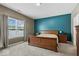 Serene Primary bedroom with a king-size bed, soft carpet, and a calming color scheme for restful nights at 4736 Blue Marlin Way, Indianapolis, IN 46239