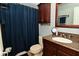 Elegant bathroom featuring a modern vanity, granite countertop, and a shower at 4751 N Longworth Ave, Indianapolis, IN 46226