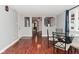 Dining Room with hardwood flooring and glass table and chairs at 4751 N Longworth Ave, Indianapolis, IN 46226