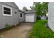 View of detached garage and driveway, providing convenient parking and storage solutions at 4751 N Longworth Ave, Indianapolis, IN 46226