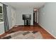 Spacious living room featuring hardwood floors, neutral paint, and a welcoming atmosphere at 4751 N Longworth Ave, Indianapolis, IN 46226