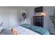 Cozy bedroom with TV, dresser, double door closet, and soft lighting at 488 Village Blvd, Mooresville, IN 46158