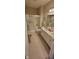 Bathroom with a double vanity, shower with glass doors, and neutral color scheme at 5189 Bally Bunion Dr, Avon, IN 46123