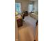 Bedroom featuring neutral walls, wood desk, and windows with natural light at 5189 Bally Bunion Dr, Avon, IN 46123