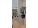 Walk-in closet with wire shelving, hanging clothes, and ample storage space at 5189 Bally Bunion Dr, Avon, IN 46123