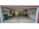 Spacious two-car garage with storage and organization. Lighting included at 5189 Bally Bunion Dr, Avon, IN 46123