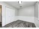 Bedroom with gray flooring, chair rail, and a large closet with double doors at 5401 Padre Ln, Indianapolis, IN 46237