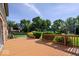 A spacious deck overlooks the expansive lawn and landscaped backyard of this home at 567 Hawthorne Dr, Carmel, IN 46033