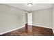 Neutral bedroom with hardwood floors and white trim at 572 Quail Ridge Dr, Westfield, IN 46074
