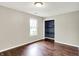 Neutral bedroom featuring hardwood floors, a closet and natural light at 572 Quail Ridge Dr, Westfield, IN 46074