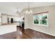 Bright kitchen with stainless appliances, island, and a view of backyard at 572 Quail Ridge Dr, Westfield, IN 46074