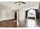 Spacious living room featuring wood floors, vaulted ceilings, and lots of natural light at 572 Quail Ridge Dr, Westfield, IN 46074