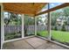 Screened-in patio with a wood ceiling and a view of the backyard and fence at 572 Quail Ridge Dr, Westfield, IN 46074