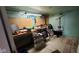 Image of unfinished basement room, featuring a workbench with tools and assorted supplies at 600 Old Moore Rd, Martinsville, IN 46151