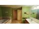 Bathroom with tub, tile floors, and vanity with sink at 600 Old Moore Rd, Martinsville, IN 46151