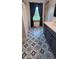 Bathroom featuring a single vanity, decorative flooring, and a shower/tub combo at 600 Old Moore Rd, Martinsville, IN 46151