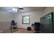 Bedroom with a window, ceiling fan, and secure metal safe at 600 Old Moore Rd, Martinsville, IN 46151