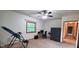 Bedroom with a window, ceiling fan, and secure metal safe at 600 Old Moore Rd, Martinsville, IN 46151