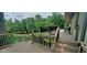 A spacious deck overlooks the tranquil pond, providing a perfect spot for outdoor relaxation and entertaining at 600 Old Moore Rd, Martinsville, IN 46151
