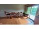 Dining area adjacent to sliding glass doors with great natural light at 600 Old Moore Rd, Martinsville, IN 46151